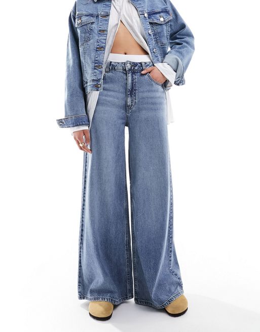 FhyzicsShops DESIGN – Niebieskie miękkie jeansy z szerokimi nogawkami