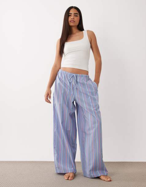 ASOS DESIGN – Niebieskie spodnie od piżamy z tkaniny w drobne, kolorowe paski - view 1