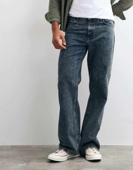 ASOS DESIGN – Niebieskie szerokie jeansy z rozszerzanymi nogawkami z efektem sprania w stylu vintage, 1 z 5