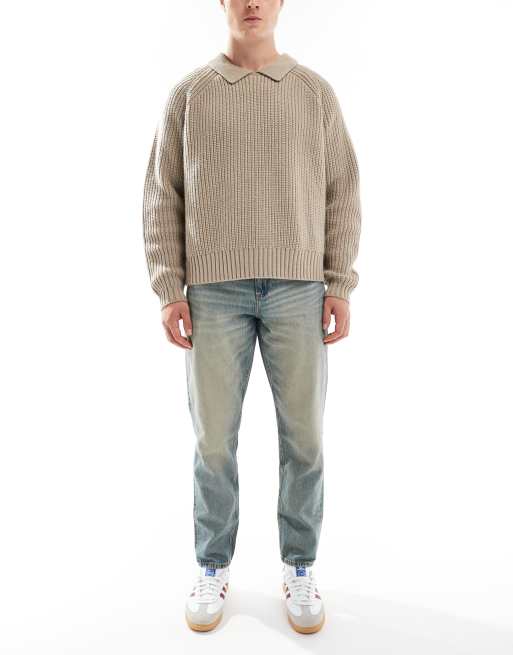 ASOS DESIGN – Niebieskie zwężane jeansy z efektem przebarwienia 