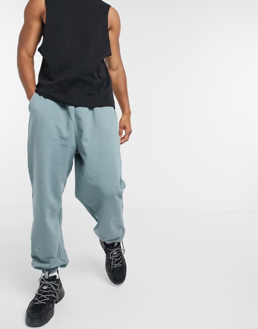ASOS DESIGN – Niebieskoszare joggersy o fasonie super oversize z troczkami przy mankietach – GREY