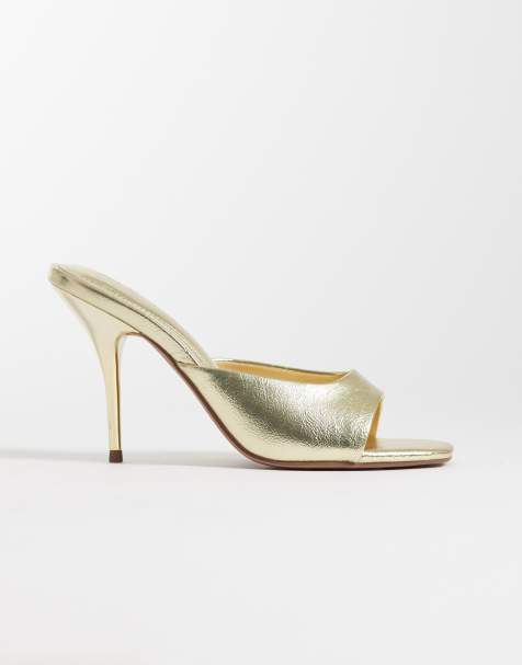 ASOS DESIGN Nighty high heeled mules in gold - view 1