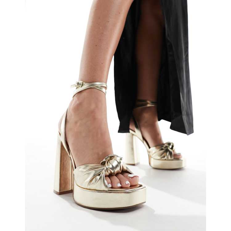 ASOS DESIGN Nikita Sandales a talon carre et semelle plateforme avec detail noue Dore ASOS