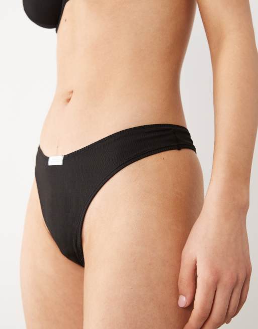 ASOS DESIGN Nora rib knit high leg thong with tab detail in black, 2 of 4