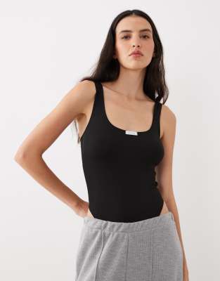 Asos Design Nora Ribbed Soft Bodysuit With Tab Detail In Black