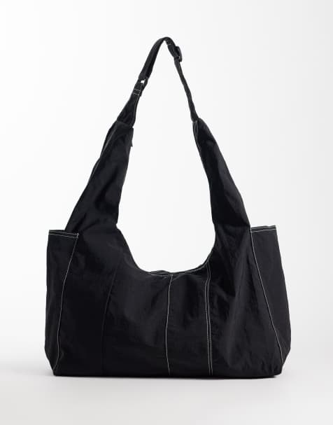 ASOS DESIGN nylon cross-body bag with contrast stitching in black - view 1