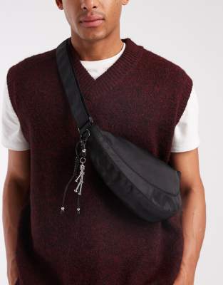 ASOS DESIGN ASOS DESIGN nylon crossbody bag with charm detail in black