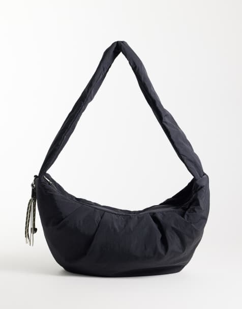 ASOS DESIGN nylon crossbody shoulder bag in black with cord charm - view 1