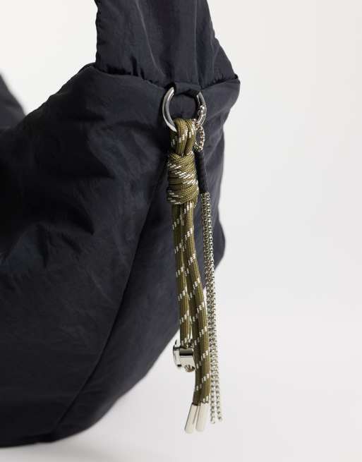 ASOS DESIGN nylon crossbody shoulder bag in black with cord charm, 3 of 4