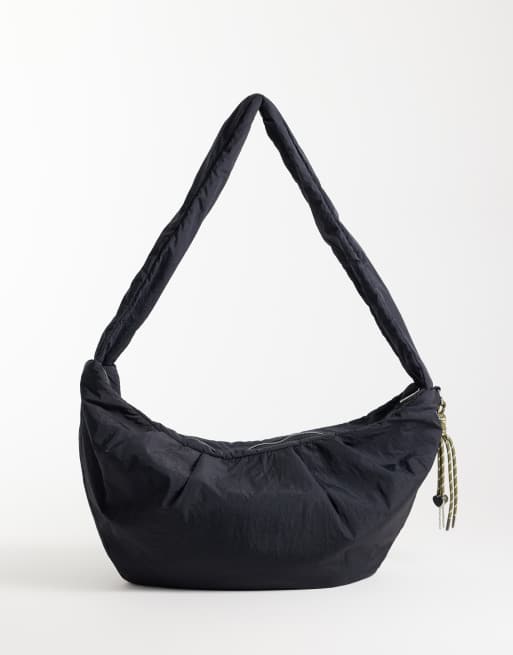 ASOS DESIGN nylon crossbody shoulder bag in black with cord charm, 4 of 4