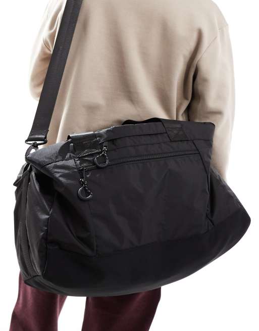 ASOS DESIGN nylon duffle bag in black