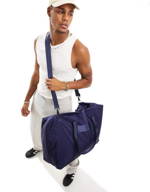 ASOS DESIGN nylon holdall bag in navy