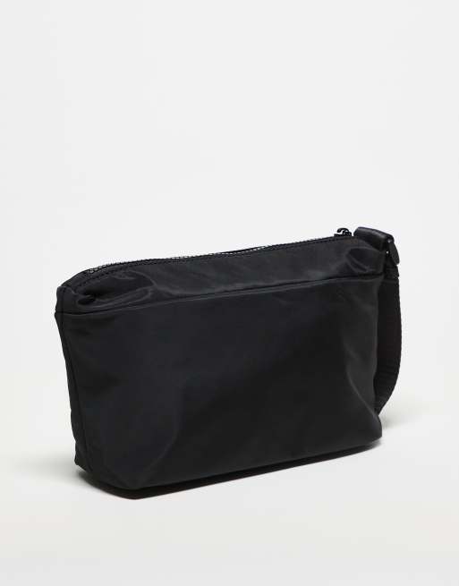 ASOS DESIGN – Nylon-Kulturbeutel in Schwarz mit seitlichen Verstellriemen, 3 von 3