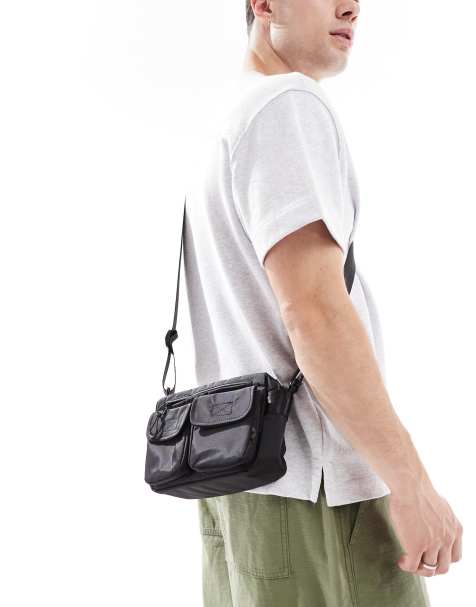 ASOS DESIGN nylon pocket festival crossbody bag in black - view 1