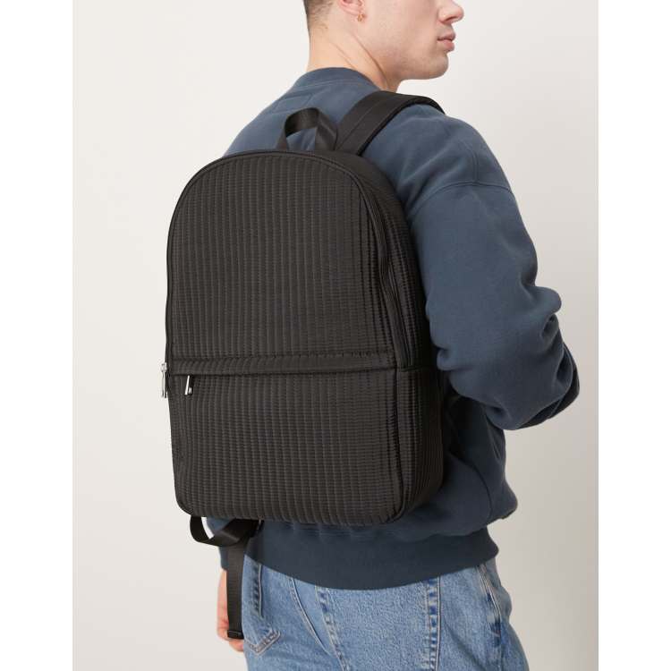 asos mini quilted backpack ASOS DESIGN nylon quilted backpack in black