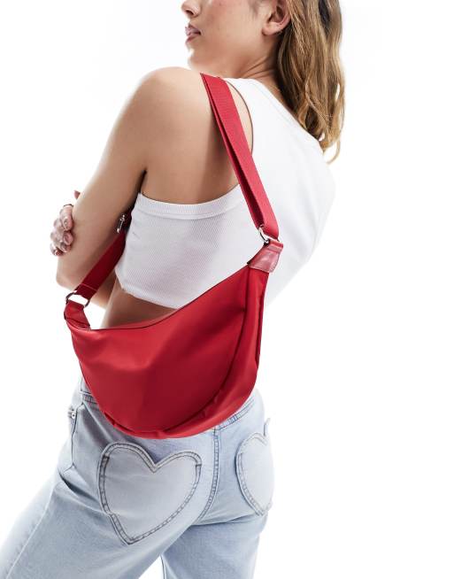 ASOS DESIGN nylon sling cross body bag in red