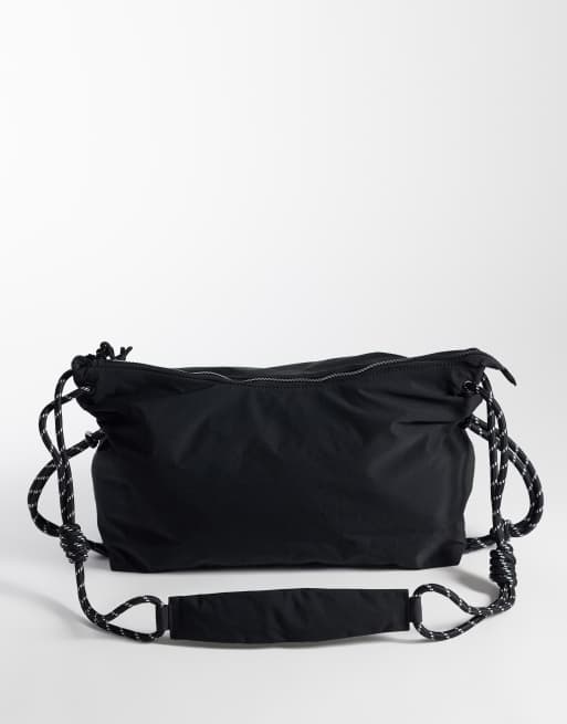 ASOS DESIGN nylon slouch sling crossbody bag in black, 4 of 4