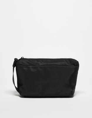 ASOS DESIGN nylon toiletry bag with side adjusters in black - view 1