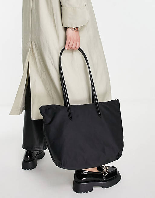 ASOS DESIGN nylon tote bag with patent handle in black