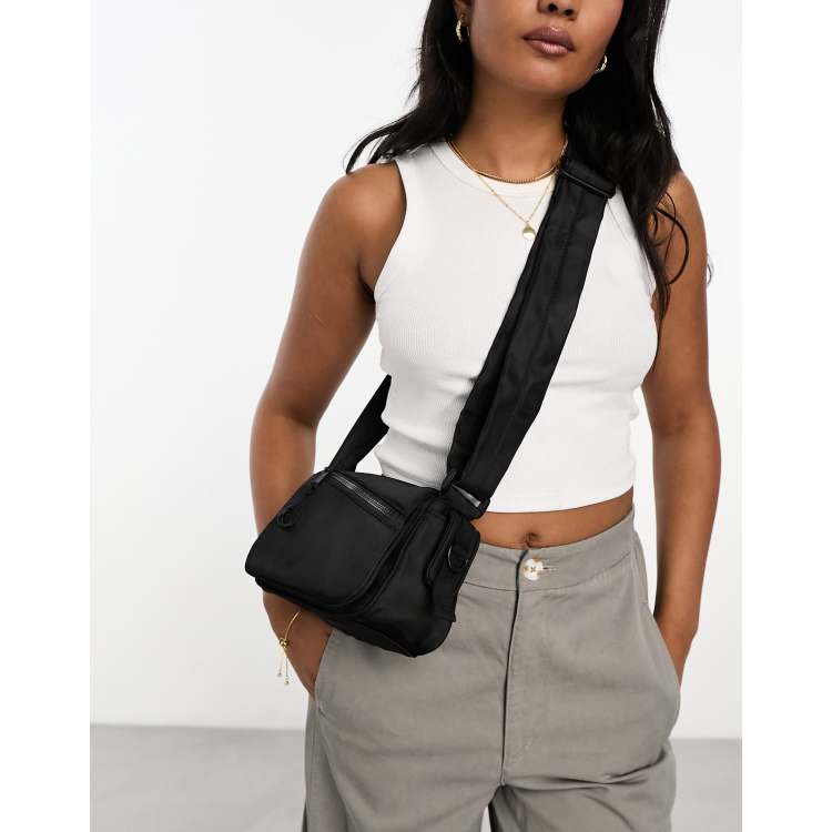 ASOS DESIGN cross body bag in gray nylon with black tech details