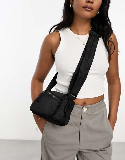 ASOS DESIGN cross body bag with buckle detailing and detachable strap in  black nylon