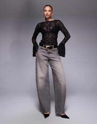 ASOS DESIGN - Oberteil aus durchscheinender Spitze in Schwarz mit ausgestellten Bündchen