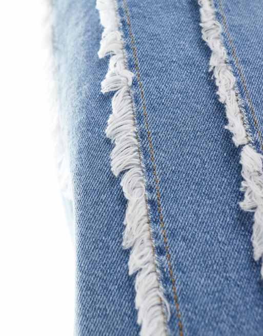 ASOS DESIGN – Obszerne jasnoniebieskie jeansy z postrzępionymi wstawkami, 2 z 5