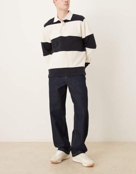 ASOS DESIGN – Obszerne jeansy w kolorze indygo z odsłoniętym zapięciem na guziki - view 1