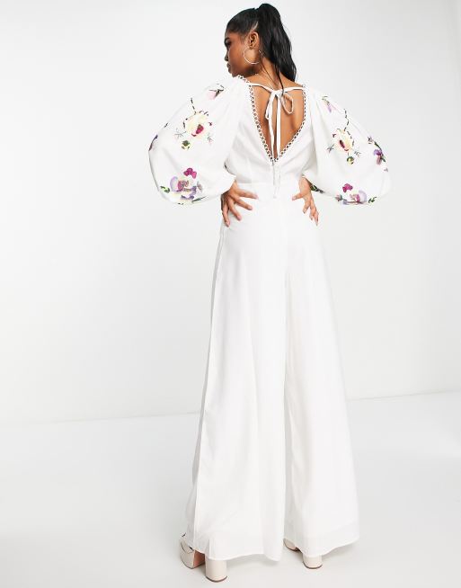 ASOS DESIGN occasion big sleeve tie front wide leg jumpsuit with embroidery  in white