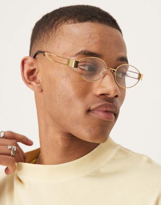 ASOS DESIGN - Occhiali da sole arrotondati dorati in metallo con lenti trasparenti