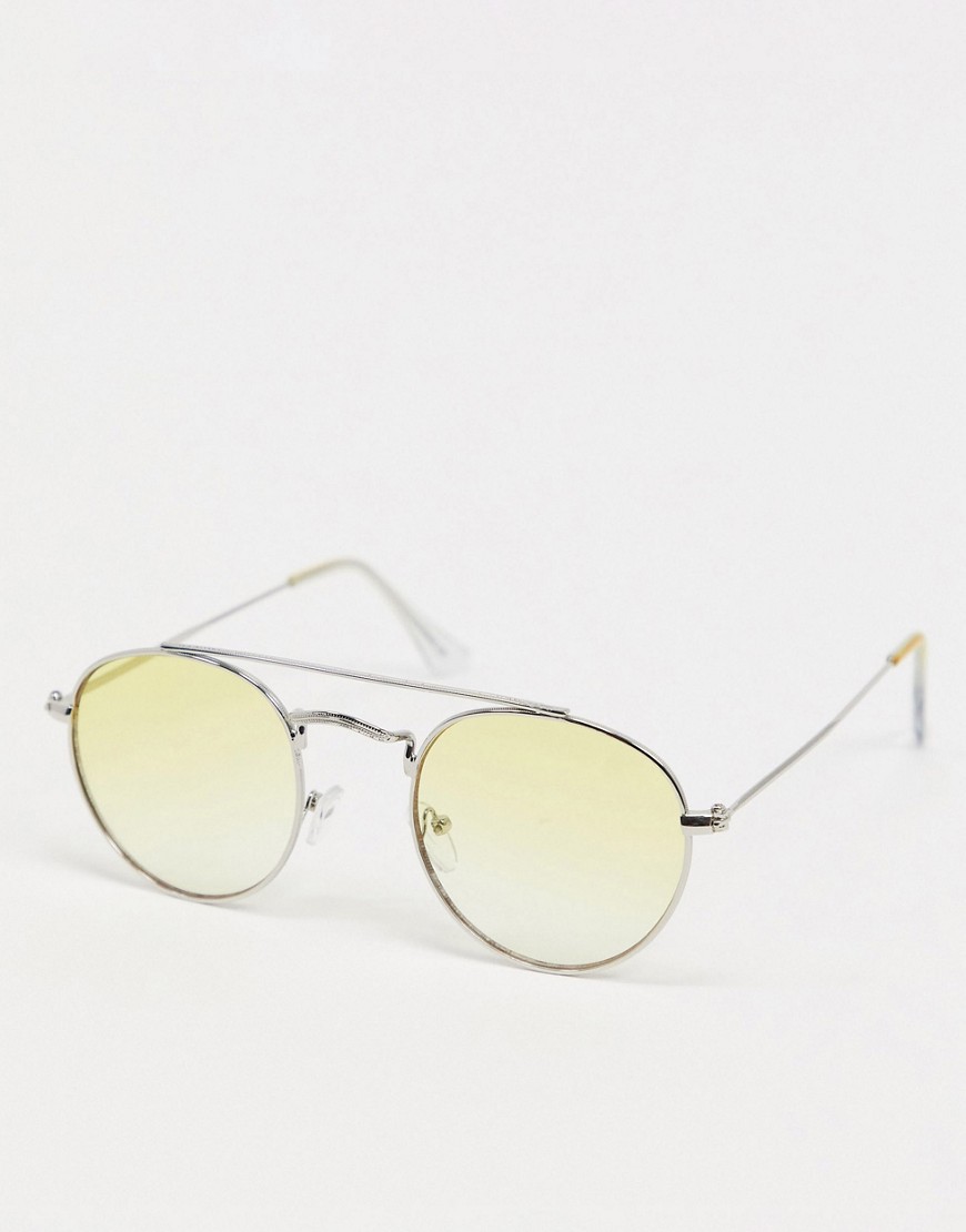 ASOS DESIGN - Occhiali da sole rotondi in metallo color argento con barretta e lenti gialle