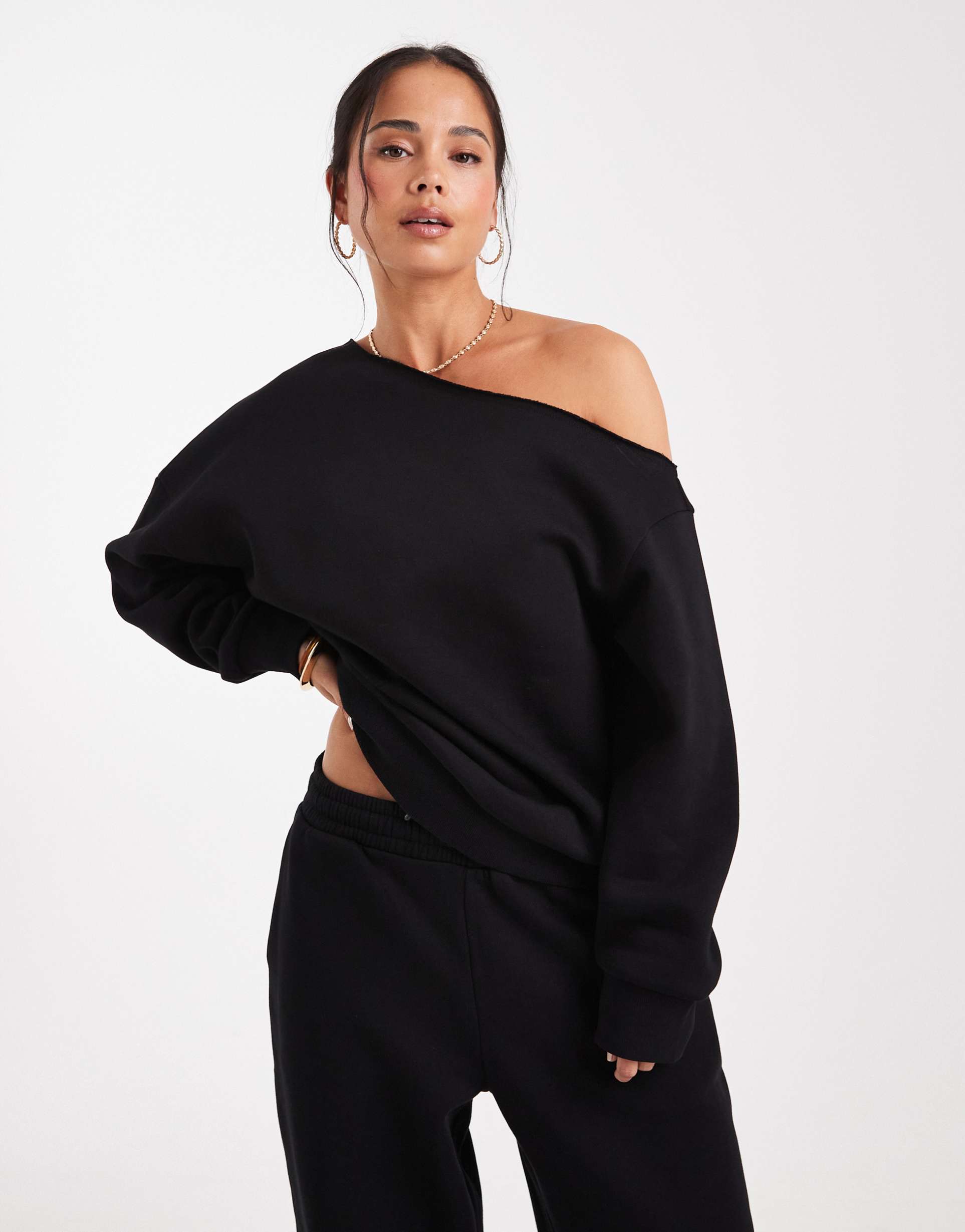 asos design off the shoulder brushback sweatshirt in black