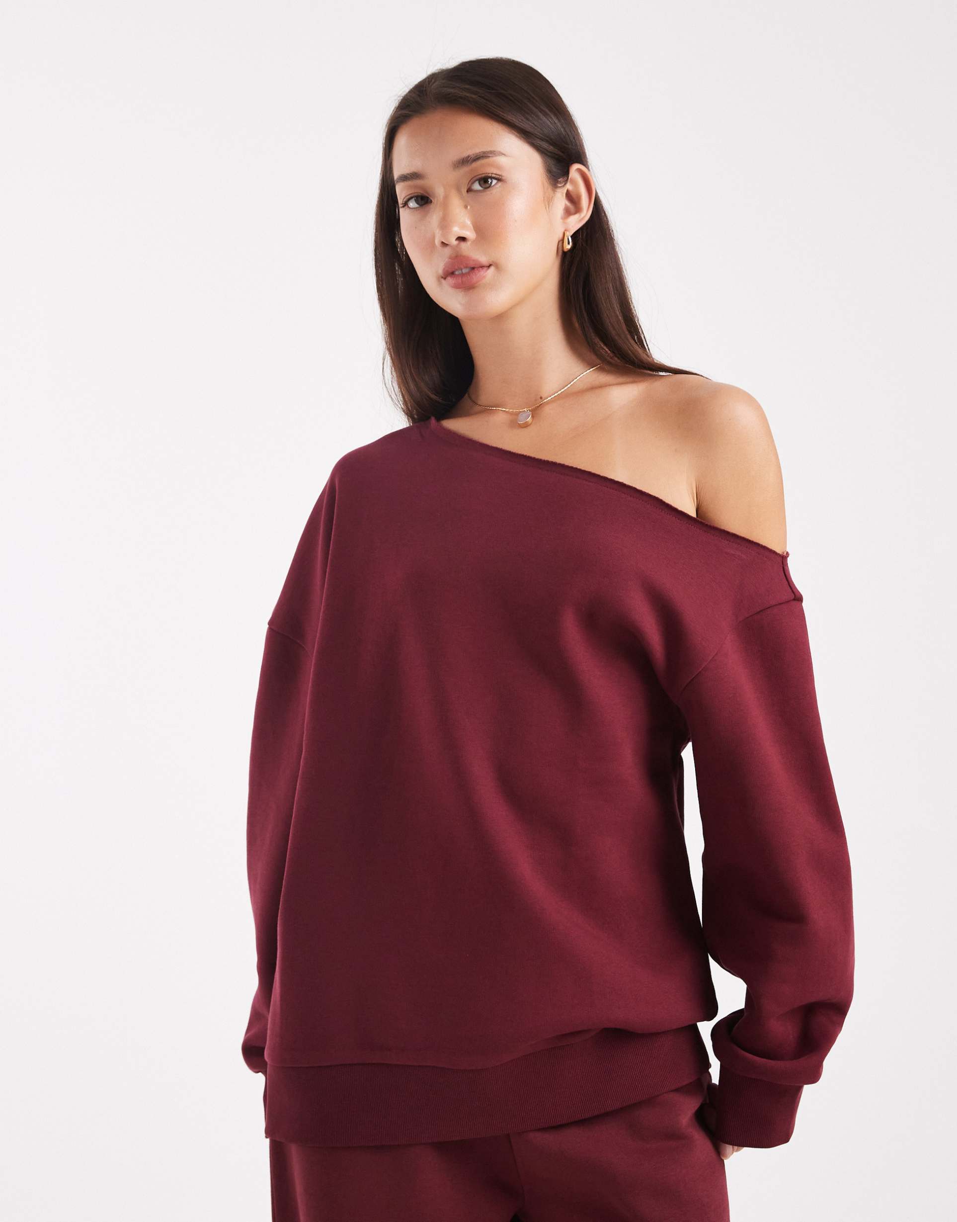 asos design off the shoulder brushback sweatshirt in burgundy