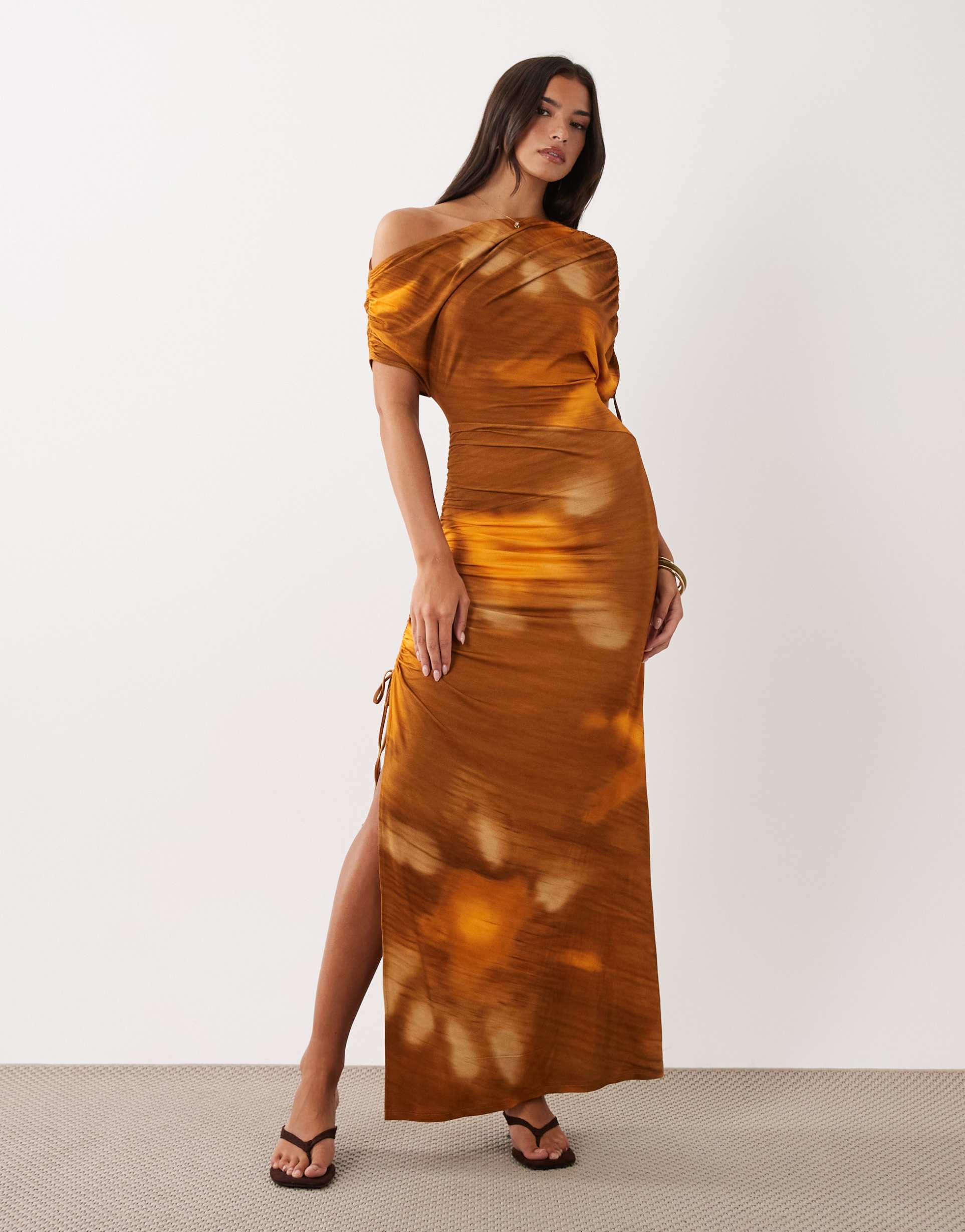 asos design off the shoulder tie detail midaxi dress in orange abstract print