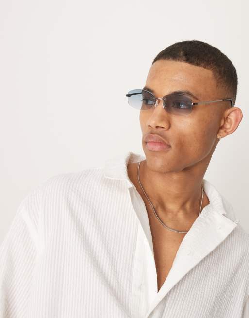 ASOS DESIGN – Okrągłe bezramkowe okulary przeciwsłoneczne z niebieskimi soczewkami i srebrnymi zausznikami