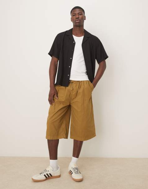 ASOS DESIGN - Olivengrønne lange shorts med læg og bælte - view 1