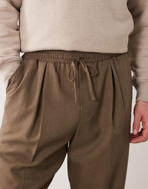 ASOS DESIGN – Olivgröna, figursydda byxor i dra på-modell med vida ben, 5 av 5