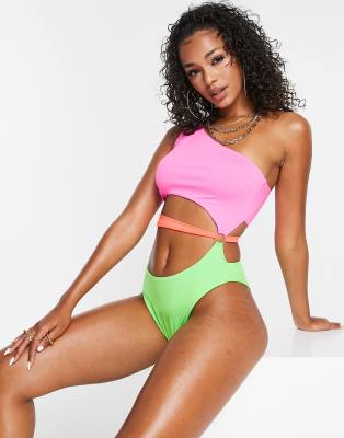 ASOS DESIGN twist front color block swimsuit in neon yellow and pink