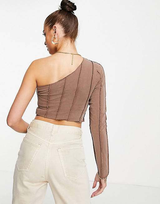  one shoulder top with exposed seams in washed brown 