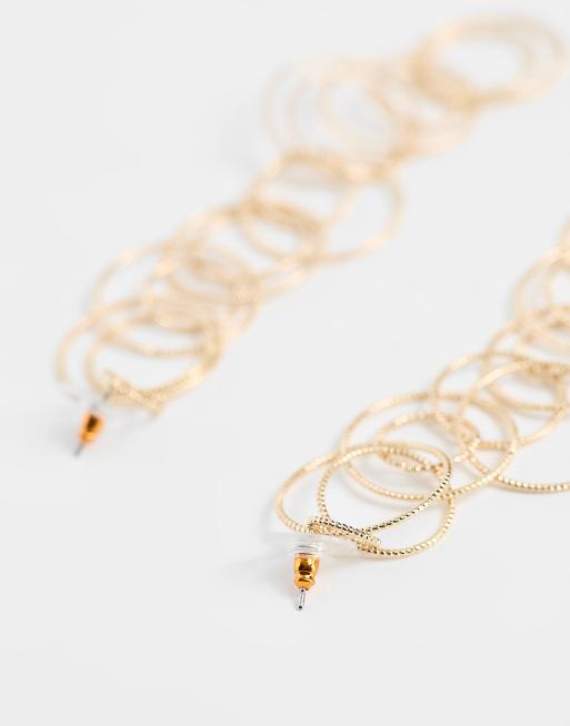 ASOS DESIGN - Oorbellen met meerdere fijne ringen in goudkleur, 3 van 4