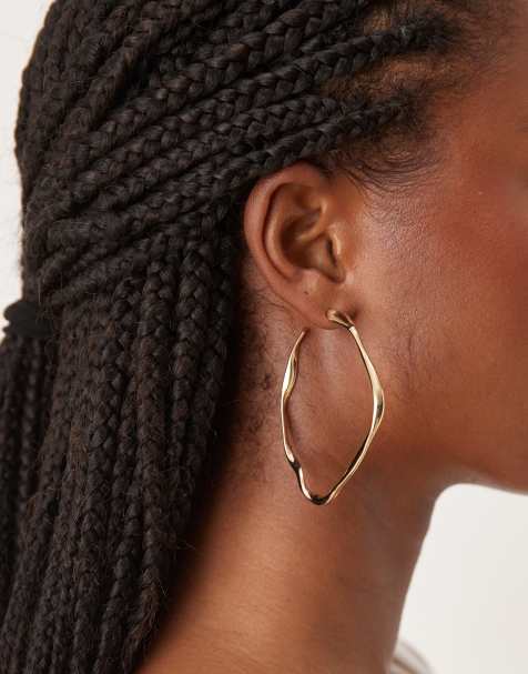 ASOS DESIGN - Orecchini a cerchio grandi dorati con design astratto attorcigliato - view 1