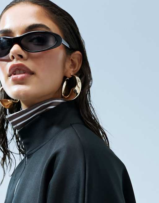 ASOS DESIGN - Orecchini a cerchio medi da 50 mm con motivo intrecciato color oro