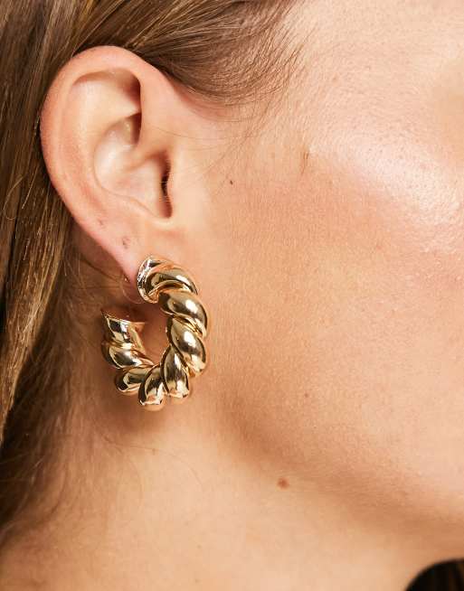 ASOS DESIGN - Orecchini a cerchio spessi color oro con design attorcigliato 