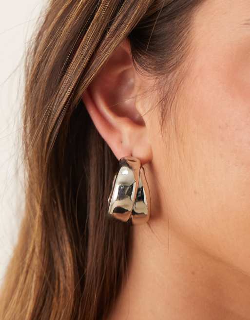 ASOS DESIGN - Orecchini a cerchio voluminosi color argento con incrocio