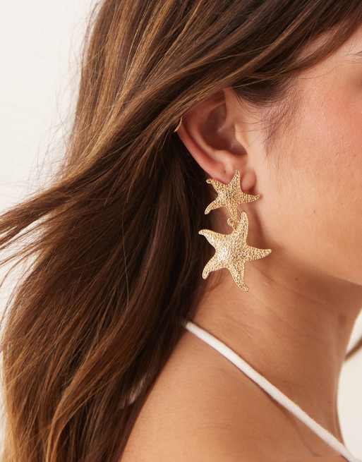 ASOS DESIGN - Orecchini color oro con doppia stella marina pendente