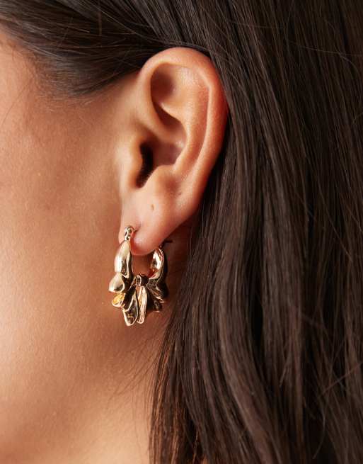 ASOS DESIGN - Orecchini dorati con dettagli a forma di fiocchi