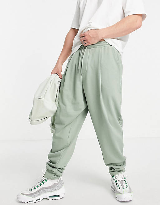 Men organic co-ord oversized wide leg joggers with pressed pleat in green 