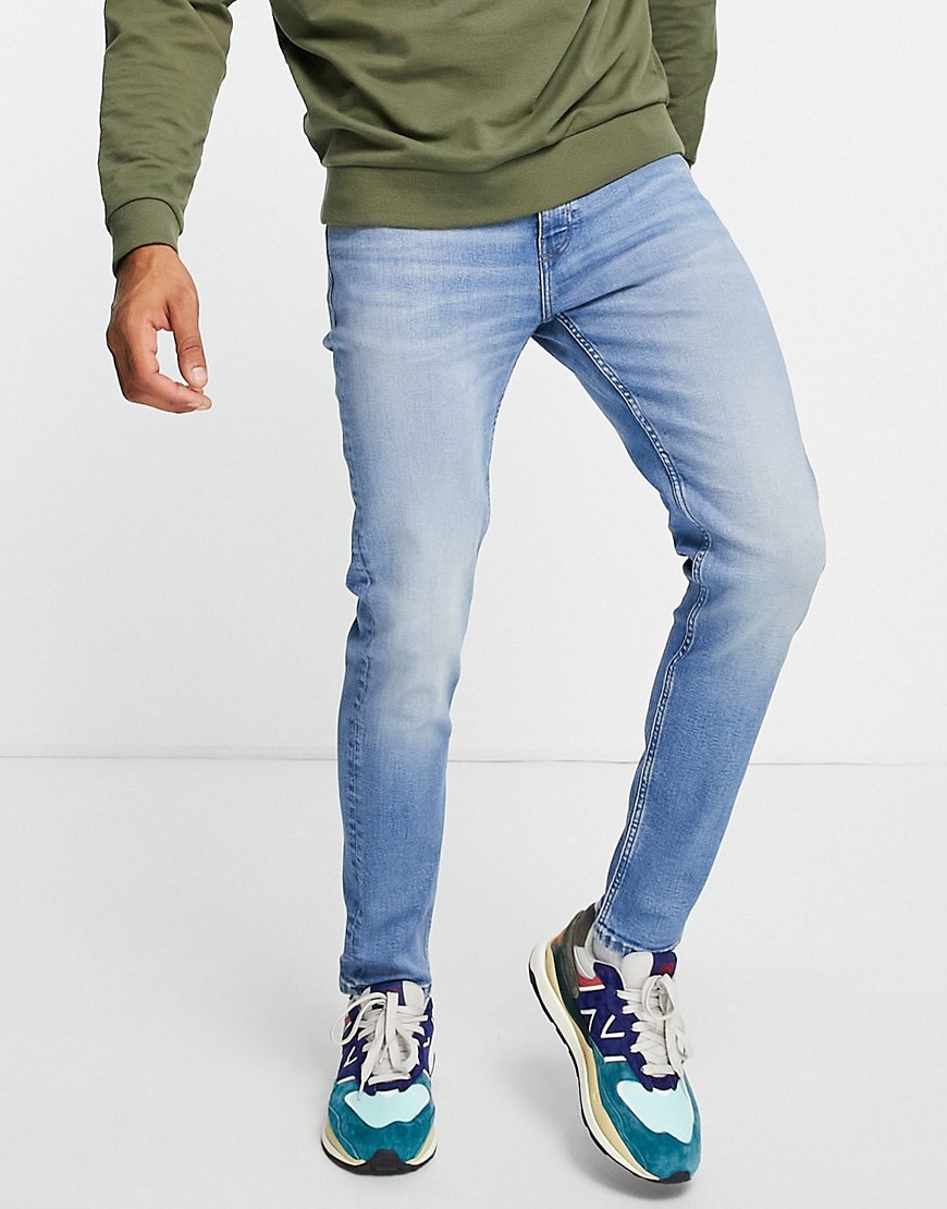 Asos Design Skinny Jeans In Tinted Light Wash - Lblue - Lblue In Blues