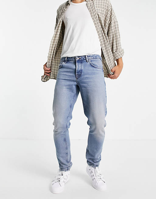 ASOS DESIGN cotton blend slim jeans in tinted light wash - MBLUE
