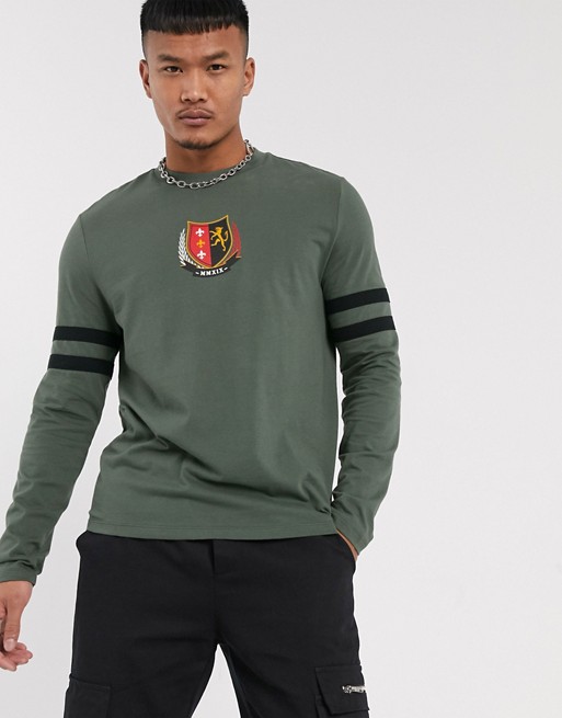 ASOS DESIGN organic cotton long sleeve t-shirt with emblem chest print and sleeve colour block